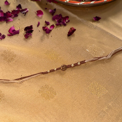 Beige Brown Om Rakhi for Brother