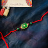 Emerald Green Carved Stone Rakhi